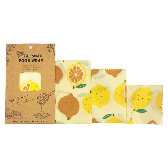 Set of beeswax food wraps with lemon design on a white background