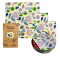 Beeswax food wrap with floral pattern and packaging on a white background

