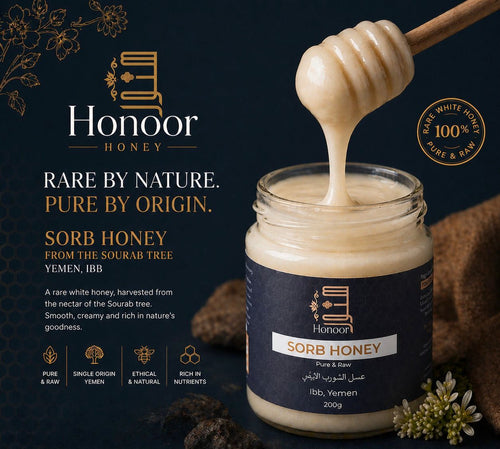 Honoor Honey jar with honey being dripped from a wooden dipper on a dark background

