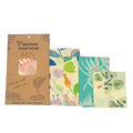 Set of beeswax food wraps with packaging on a white background

