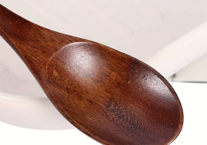 Wooden spoon with a blurred background

